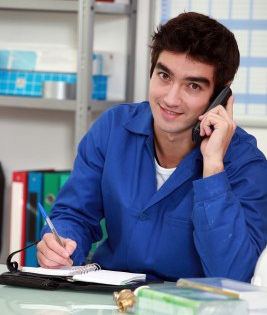 Mike is on the phone taking with a happy client